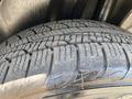 Close-up of a textured tire tread for a 2019 Dodge Charger showing detailed grooves and patterns designed for traction and performance