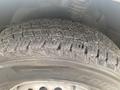 Close-up of a tire from a 2017 Mercedes-Benz Sprinter showing detailed tread pattern and rubber surface.