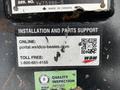 A label attached to a 2024 Caterpillar 306 with information about installation parts support and a quality inspection sticker