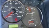 Dashboard of a 2006 Ford LCF 550 showing speedometer fuel gauge and engine temperature gauge with various readings displayed