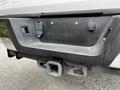 A 2017 Ford F-250 with a towing hitch and connection points visible on the rear bumper