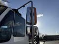 A 2017 International 4300 truck showcasing its side mirror and chrome details