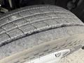 Close-up of a worn tire from a 2018 Hino 195 showcasing visible tread wear and texture on the surface