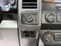 Close-up view of the control panel of a 2019 Ford F-350 SD featuring knobs for terrain settings and climate control functions