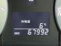 Display panel of a 2009 Toyota Vellfire showing an external temperature of 6 degrees Celsius and an odometer reading of 67992 kilometers