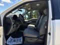 Interior of a 2020 Ford F-350 SD featuring two front seats with grey upholstery and a visible dashboard