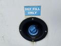 DEF fill opening on a 2012 Chevrolet Express with a blue cap labeled for filling