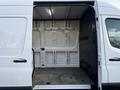 Interior of a 2019 Mercedes-Benz Sprinter van showing an empty cargo space with white walls and a grey floor