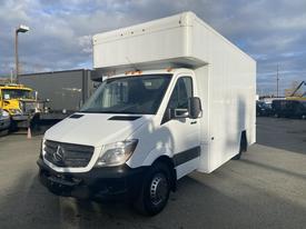 A 2017 Mercedes-Benz Sprinter van with a large white cargo box in the rear and a black front bumper facing slightly to the left