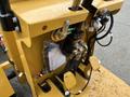 Close-up of the hydraulic system of a 2024 AGT Industrial KRW23 Mini Loader showing valves hoses and connectors