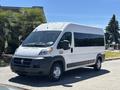 A white 2016 RAM Promaster van with tinted windows and black accents parked on a paved surface