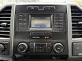 The dashboard of a 2019 Ford F-350 SD featuring a touchscreen display with radio controls and climate settings