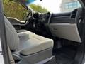 Interior view of a 2017 Ford F-250 SD showing the driver's seat and dashboard with various controls and features