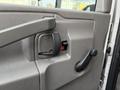 Door handle and window crank of a 2019 Chevrolet Express van interior