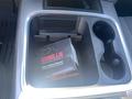 A black box labeled Gorilla Automotive Products sits in the center console of a 2021 RAM 1500