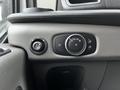 The image shows the interior control panel of a 2020 Ford Transit featuring various dials and switches including a headlight control knob