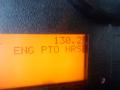 Display panel showing an orange screen with digital readout indicating 130.2 for ENG PTO HRS on a 2014 International Durastar