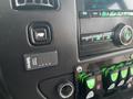 Dashboard controls of a 2017 Chevrolet Express featuring buttons for power levels and various functions