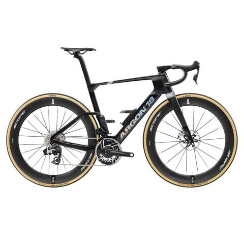 A 2026 Argon 18 Nitrogen Pro road bike featuring a sleek carbon frame SRAM RED AXS groupset and aerodynamic design with distinctive black and blue color accents