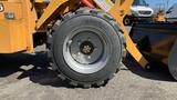 A close-up of a tire from a 2024 Traner TR45 showing tread design and a metallic rim