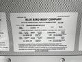 A label displaying manufacturing details for a 2022 Blue Bird Vision including vehicle identification number, weight specifications, and date of manufacture