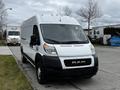 A 2021 RAM Promaster van in white with a smooth front design and prominent RAM logo on the grille