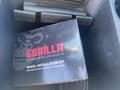 A black box with a gorilla logo labeled Gorilla Automotive Products containing a wheel installation kit