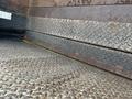 A 2008 Mitsubishi Fuso FE180 with a metal diamond plate bed showing signs of wear and rust