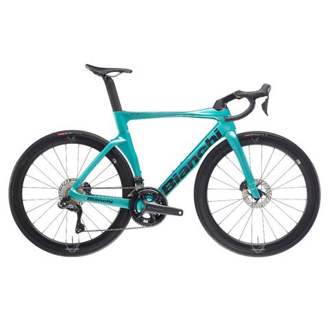 2026 Bianchi Oltre Comp SRAM Rival AXS E1 Carbon Aero Road Bike featuring a sleek turquoise frame and high-performance aero design with disc brakes and aerodynamic wheels