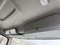 Interior view of a 2017 Hino 338 truck's ceiling showing overhead storage compartments and lights
