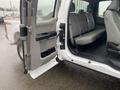 A 2017 Ford F-250 SD with the passenger side door open revealing a spacious interior and gray seating