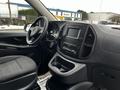 Interior view of a 2019 Mercedes-Benz Metris showing the front dashboard steering wheel and center console with control buttons and a touchscreen display