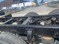 A 2008 Peterbilt 340 truck chassis showing the rear axle tires and undercarriage components without a truck body attached