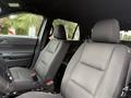 Interior of a 2019 Ford Explorer featuring two front seats with fabric upholstery and seatbelts visible