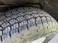 Close-up of a tire from a 2018 GMC Canyon showing the tread pattern and surface texture