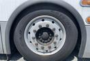 A close-up view of a tire on a 2017 Grande West Vicinity showcasing the wheel rim and lug nuts with a Goodyear tire label