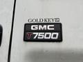 A 2006 GMC F7B042 badge displaying the GMC logo with the model number T7500 prominently featured