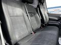 Interior view of a 2017 Mercedes-Benz Sprinter showing three seats with fabric upholstery and seat belts