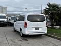 A white 2018 Mercedes-Benz Metris parked with a sleek design and distinctive rear features including the logo and taillights