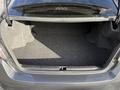 The trunk of a 2021 Subaru WRX showing a spacious, carpeted interior with a flat floor and no visible contents