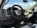 Interior view of a 2012 Dodge Ram 5500 showing the steering wheel dashboard and control panel designed for heavy-duty performance