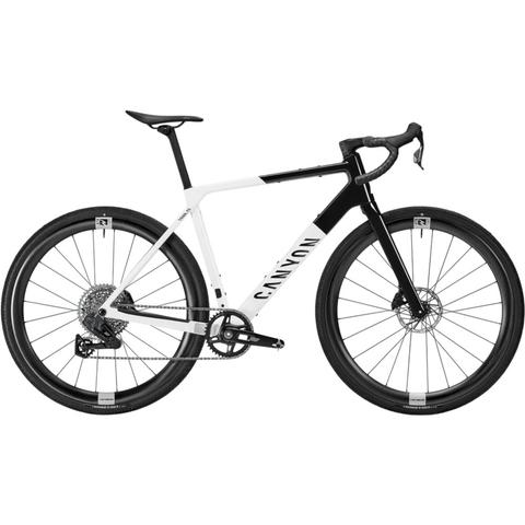 A 2026 Canyon Grail CF SL 7 Aero Carbon Gravel Road Bike featuring a white and black frame disc brakes and wide tires designed for gravel riding