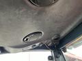 Interior ceiling of a 2012 Toro Groundsmaster 5910 featuring speakers and various controls