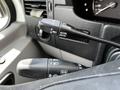 Close-up of the control stalks in a 2012 Mercedes-Benz Sprinter highlighting the cruise control and indicator functions
