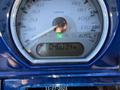 A close-up view of the speedometer of a 2017 Harley-Davidson FLHXS showing a mileage of 046034 miles