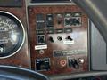 The image shows the interior dashboard of a 2009 Kenworth T270 with various control buttons including horn switches air controls and an inverter switch