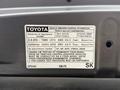 2015 Toyota Tacoma vehicle emission control information label detailing regulatory and fuel type information