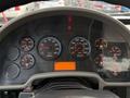 Dashboard of a 2013 International Durastar 4300 displaying various gauges including RPM speedometer fuel and voltage indicators