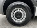 Close-up of a wheel from a 2020 Mercedes-Benz Sprinter showing a silver rim with a central star logo and a black tire labeled with the brand and model details