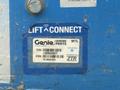 A blue sticker with the text Genie Genuine Parts Lift Connect and various alphanumeric codes including 1289520GT and an ESN number for a Genie GTH-5519 machine
